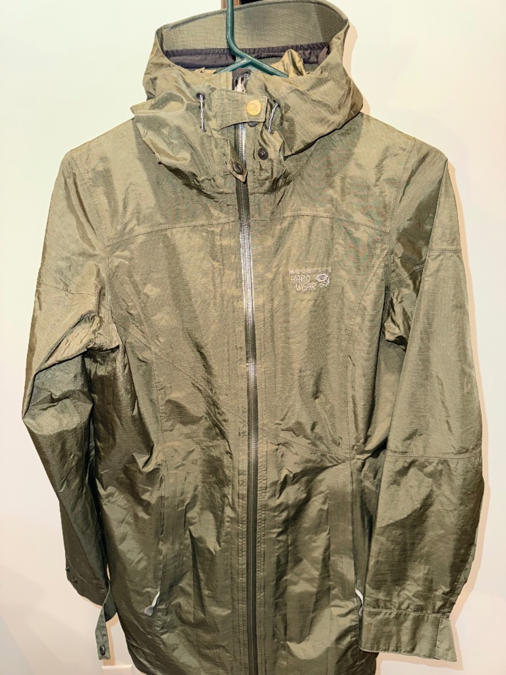 Mountain Hardwear women's long hooded rain jacket in olive green, size S